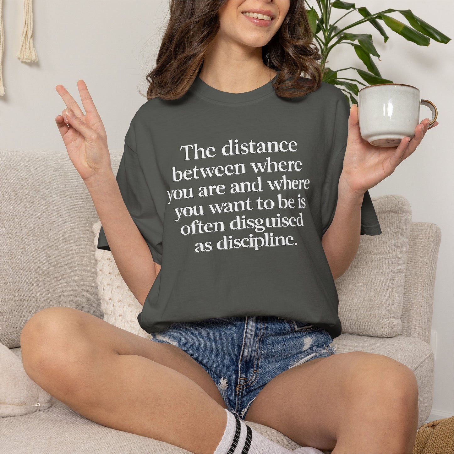 Motivational Quote T-Shirt — “The distance between where you are and where you want to be is often disguised as discipline.”
